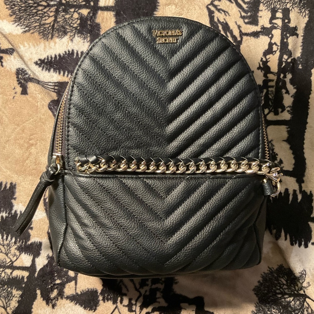 Victoria secret black leather back pack still bag/purse